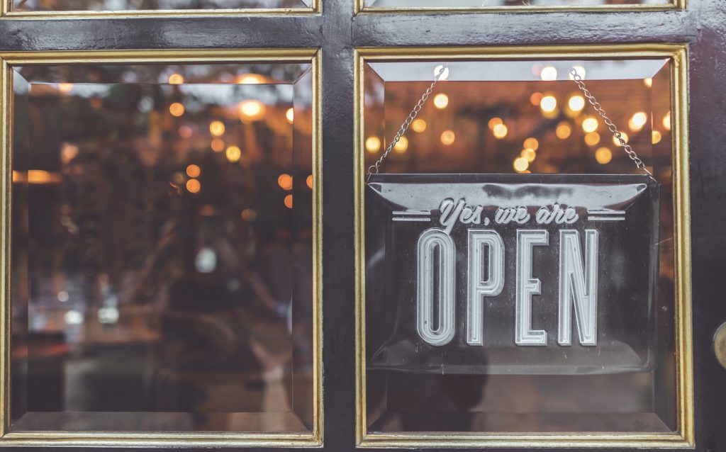 Small business open sign in window